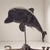 A rare Italian weathervane from the early 1900s, crafted from copper, with a three-dimensional structure and a dolphin...