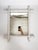White lacquered bamboo mirror, France, 1930s. Charming wall mirror composed of a turned and white lacquered bamboo frame,...