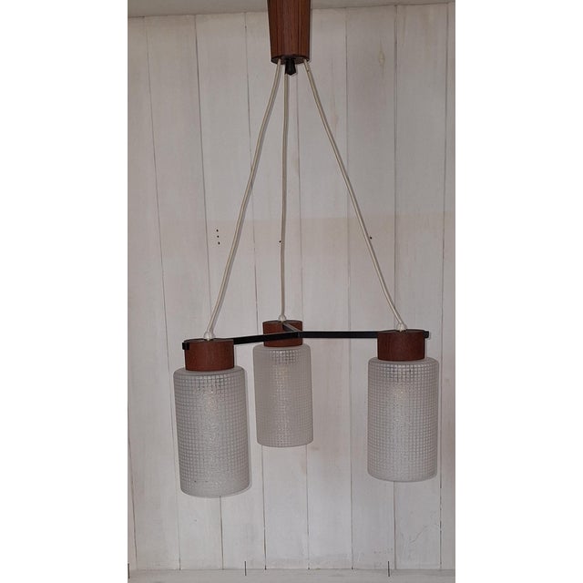 Mid-Century Ceiling Lamp with Black Metal Frame, Teak Mountings, and Glass Shades, 1960s, in Very Good conditions....