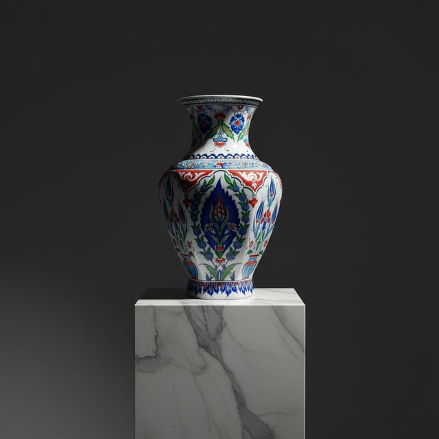 Architecture in Clay: The Faceted Iznik Vase ️ This Handmade Ceramic Vase stands out with its rare structural beauty....
