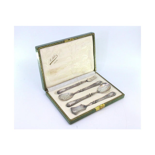 Silver Dessert Pieces with Cut-Out Shells and Embossed Handles with Floral Motifs, Set of 4, in Good conditions.