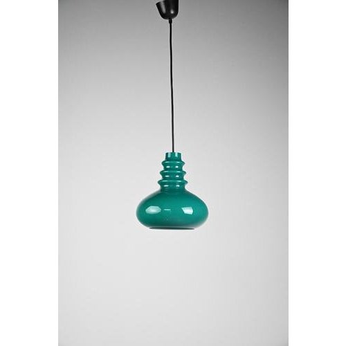 Peill & putzler ‘galaxy’ lamp in green/blue. A lamp with a beautiful shape which stands out, but wait until the switch is...