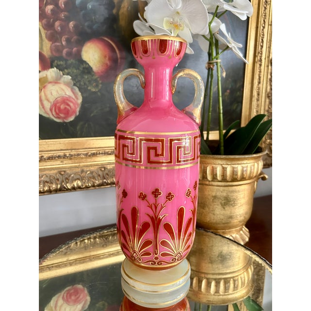A striking 19th-century Continental (likely French or German ) opaline glass vase in vibrant pink, richly decorated with...