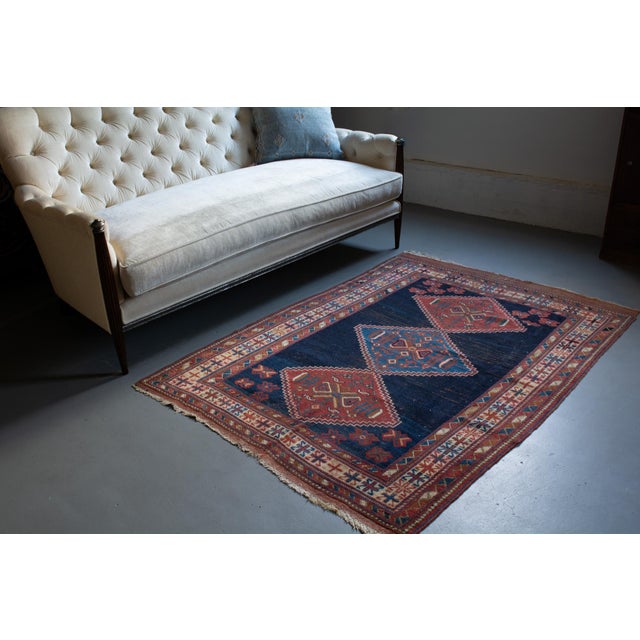 ✂ - - - - - m e a s u r e m e n t s: 4’2” x 6’, 127cm x 182.88cm, 8.85 Lbs C O L O R S Base: navy, ink blue Accents: red,...