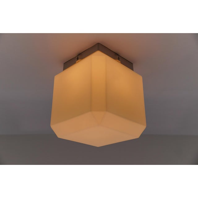 Opaline glass cube flush mount, 1960s germany the fixture need 1 x e27 standard bulb with 75w max. light bulbs are not...