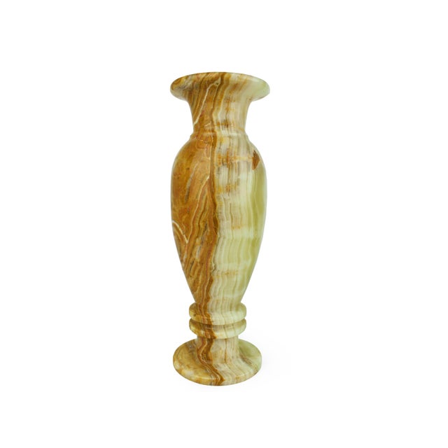 Embrace the timeless elegance of mid-20th century craftsmanship with this stunning solid onyx vase, masterfully carved...