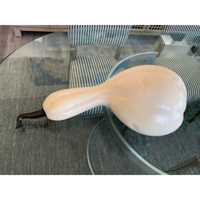 Add a rustic yet refined touch to your living space with this pair of large gourds. Their natural charm and versatility...