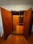 An exceptional English Art Deco wardrobe by Warings, featuring the original “Perfection Wardrobe” brass manufacturer’s...