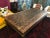 Beautiful large hand-carved antique wood table with individual bone inlay fragments placed to make the beautiful design....