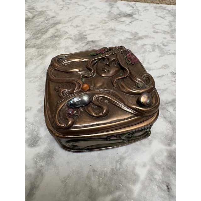 Vintage adorned rococo style jewel or trinket box with textural female design and adorned with fresh water pearl accents...