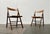 2 Mid Century folding chairs with Viennese wicker seat. Simple folding chairs made of wood. Particularly eye-catching is...