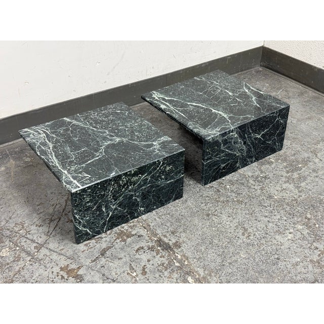 Design Plus Gallery presents a pair of Italian Marble Waterfall Edge Side Tables. Each table has a square top with...