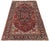 A wonderful antique Heriz rug, hand woven circa 1920. The design features a large, geometrical central medallion...