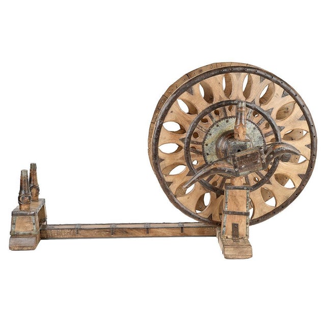 Antique Wooden Spinning Wheel, in Good conditions. This piece is designed in the style of the selected designer and/or...