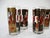 A set of six highball glasses with printed opera themes to each with a gold toned overlay titled " The Grand Opera"....