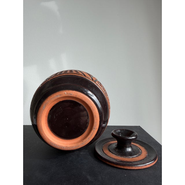 Beautiful vintage ceramic jar by unknown artist. Adds a rustic element to any space, could be used as a candy dish.