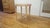 The versatile and functional Varenne Side Table completes a bed, a sofa, or a large center hall, shown with our poppy...