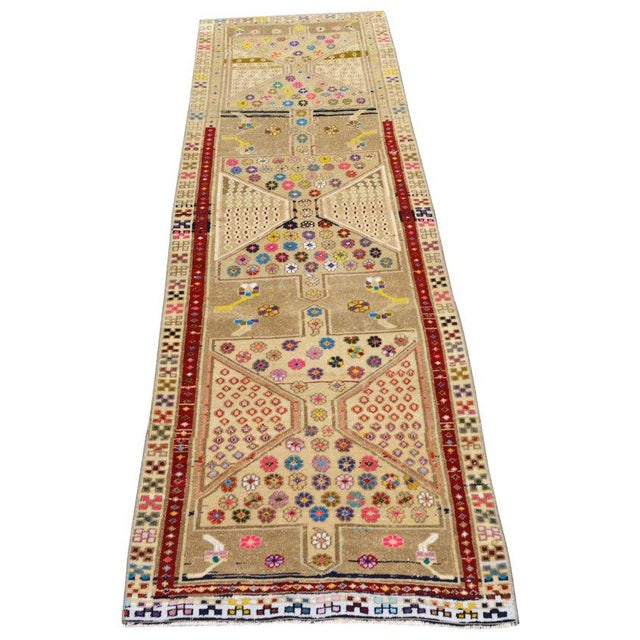 Hand-knotted with care using traditional rug-making techniques, this wool rug blends timeless craftsmanship with a modern...