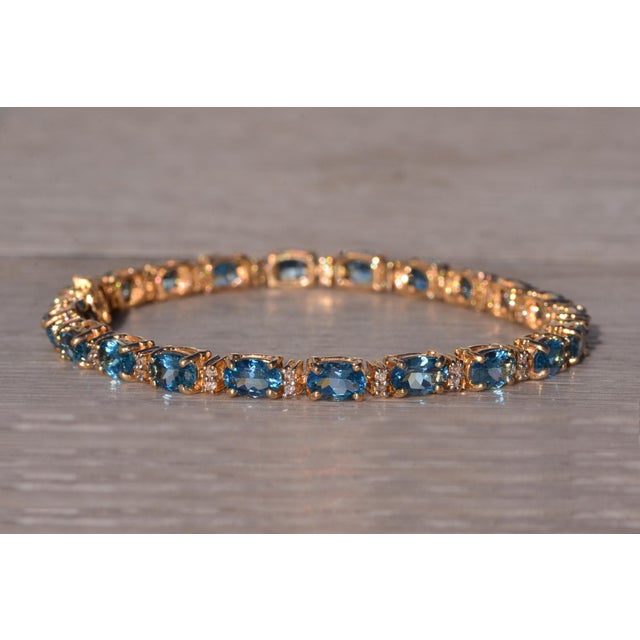 2000 - 2009 The Londinium: Blue Topaz and Natural Diamond Bracelet in Yellow Gold For Sale - Image 5 of 9