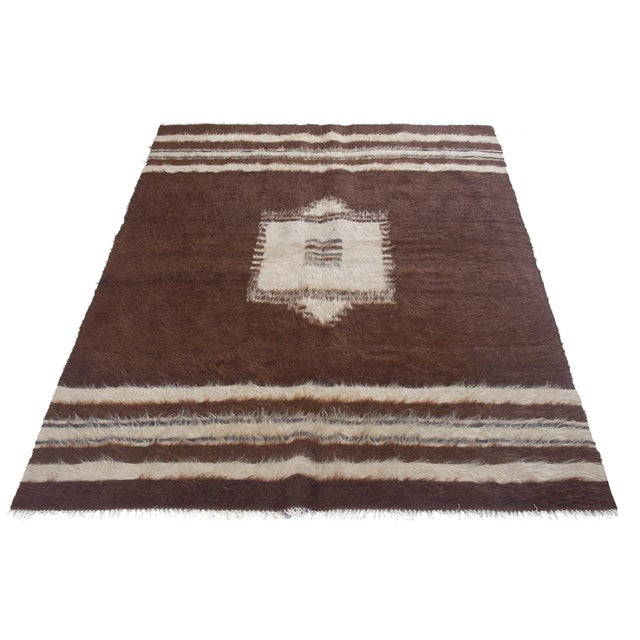 Vintage handwoven decorative kilim rug from Siirt region of Turkey. Approximately 40-50 years old. In very good condition.