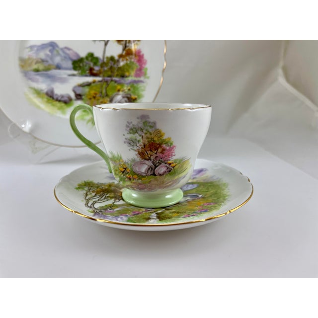 Lovely Shelley Trio in the English Lakes pattern. Excellent condition with no damage noted. It was used for display only.