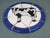 I love the personality in this hand-built Hogan Young wall tile— a glossy black-and-white cow in raised relief against a...