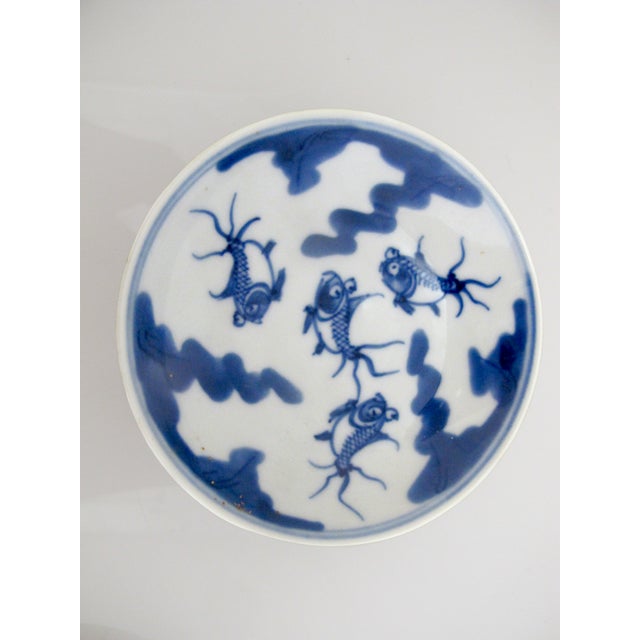 Chinese porcelain, small pedestal dishes, or possibly tops for tea bowls. Could be used as trinket dishes, saucers, candy...