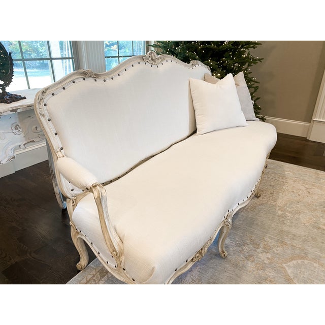 This beautiful vintage settee sofa had the original frame from the 1920’s. It was professionally refurbished, repainted...