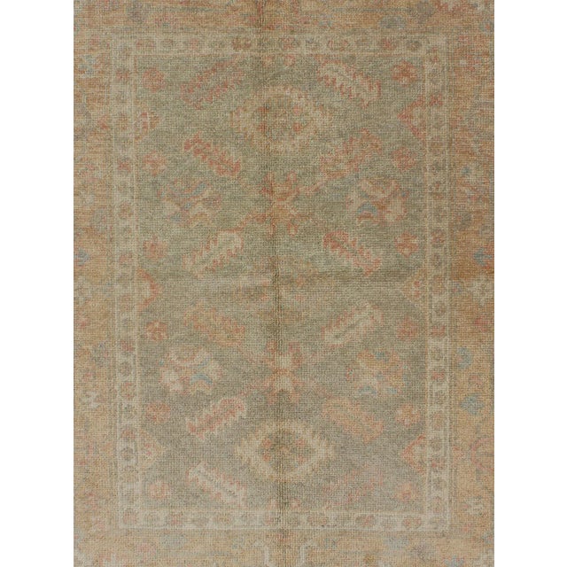 Turkish Oushak Rug in Soft Sage Green, Muted Terracotta, and Faded Blue Accents 4' X 5'3" For Sale - Image 4 of 8