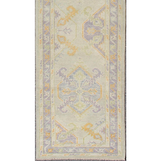 Textile Turkish Oushak Runner With a Tribal Design in Purple, Blue and L.Green Colors by Keivan Woven Arts For Sale - Image 7 of 8