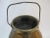 19th century copper milk pail with handle. Measures 14" tall x 11" wide at base x 7" wide opening.