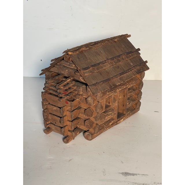 Rare collectible Antique American doll houses toys log, handmade of wood, as a log cabin.