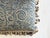 This pillow is made of vintage Fortuny fabric. It is lined with fringe and tassels.
