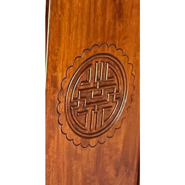 1960s six-sided rosewood drum table. Two doors in front and two shelves. Top shelf is removable. Beautiful piece of...