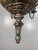 A beautifully aged Italian chandelier featuring a carved silvered wood central column with fluted and gadrooned details....