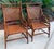 Vintage pair of classic bamboo armchairs. Handcrafted with cane seats and bamboo frames. Chinoiserie inspired. These are...