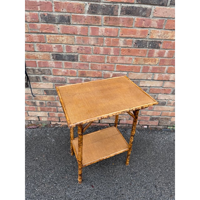 This is a beautiful 19th century English bamboo side table! Tables like these make excellent accent pieces because their...