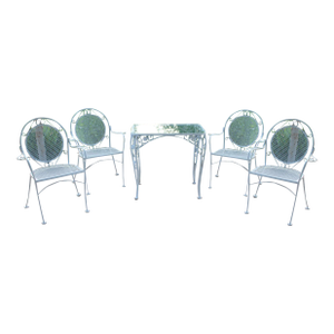 Wrought Iron Patio Set—Four Armchairs and a Table With a Glass Top