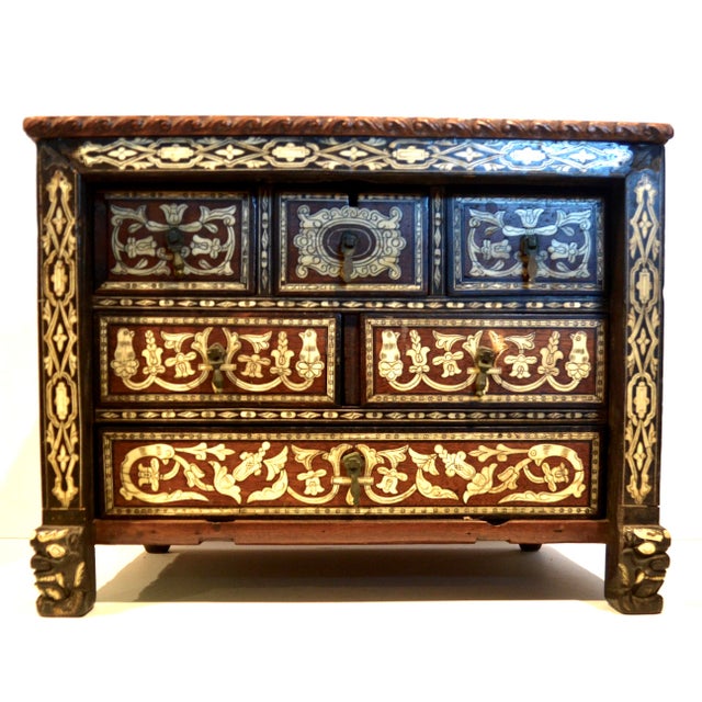 An exceptional elegant 17th Century Spanish vargueno marquetry table cabinet with a sophisticated assemblage of decorated...