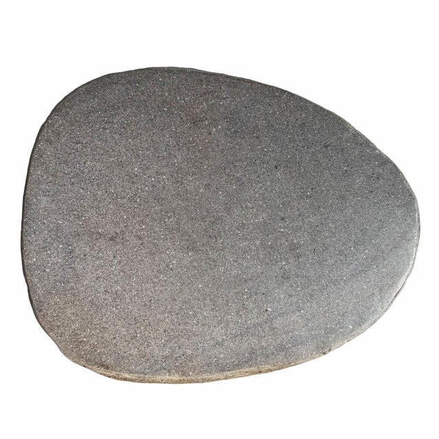 Solid heavy stone boulder vintage outdoor side table or stool. This rustic organic modern piece will look beautiful and...