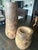 A striking pair of large hand‑carved wooden vessels showcasing the raw beauty of organic modern design. Each piece is...