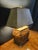 A striking vintage table lamp crafted from individually applied burnt bamboo segments in warm, richly varied tones. The...