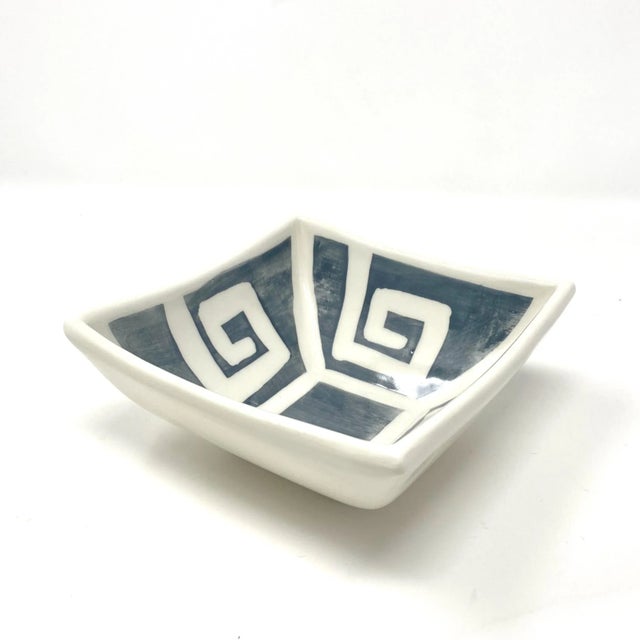 A timeless classic with a modern edge, this hand-painted dip cup bowl features the iconic Greek Key motif, symbolizing...