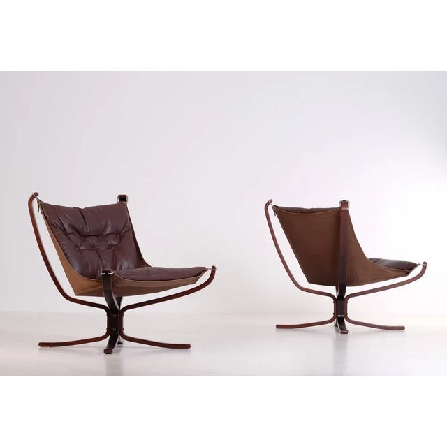 Norwegian Falcon chairs in brown leather by Sigurd Ressel, Norway, 1970s. Good vintage condition with signs of usage and...