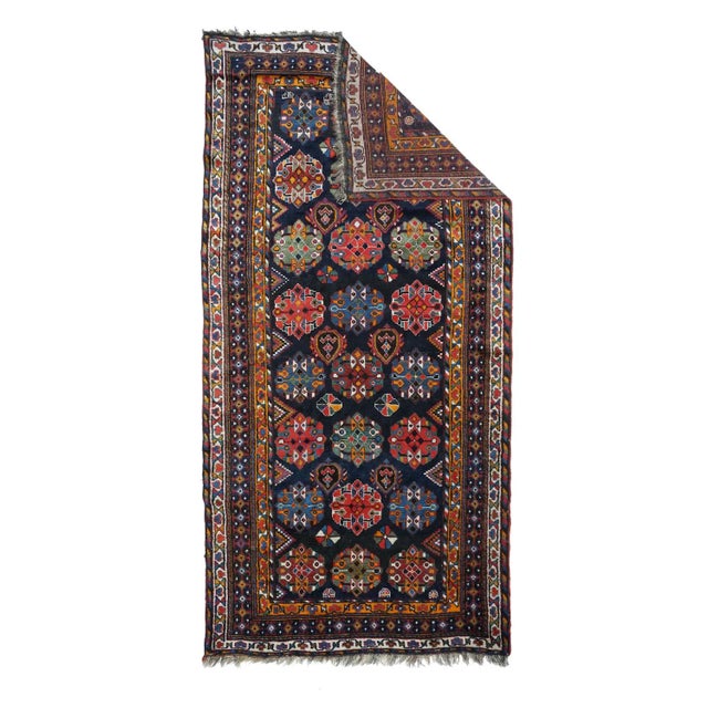 Antique Shiraz Rug 5'1'' x 10'6''. A portmanteau for any hard-to-isolate SW Persian tribal style rug. Usually refers to...