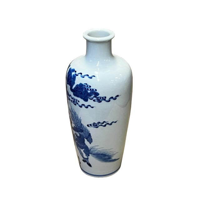 This is a Chinese decorative porcelain vase in a Blue and White color finish. The theme is an oriental people scenery...