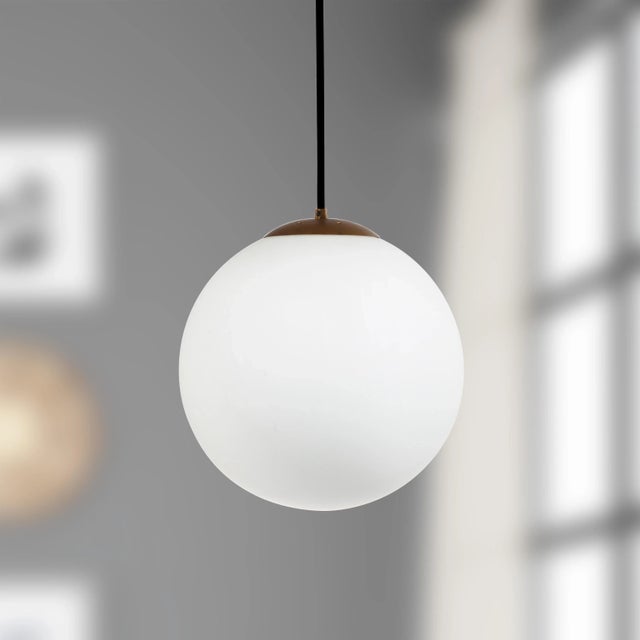 Add a touch of sleek and sophistication to your décor this contemporary pendant. Clean lines create it's elegant...