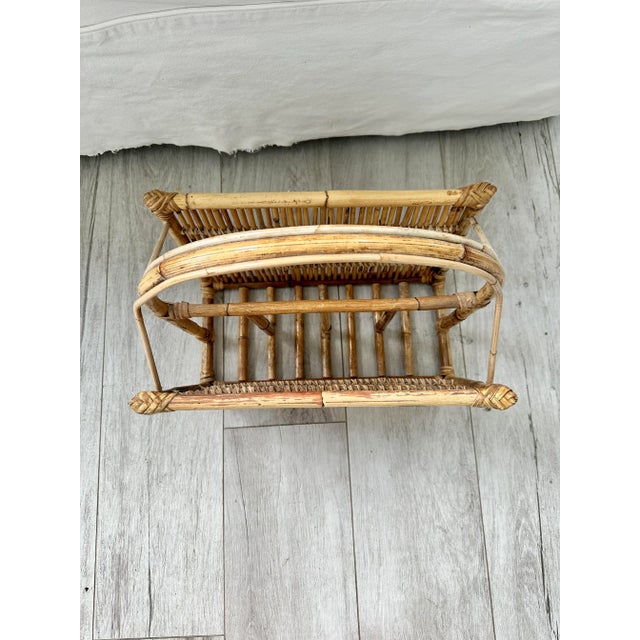 Vintage bamboo magazine rack. Burnt bamboo with rounded handle and beautiful stitching.