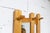 Wall-mounted coat rack in solid pine from the 1970s. Its golden finish and unique shape will add a touch of elegance to...