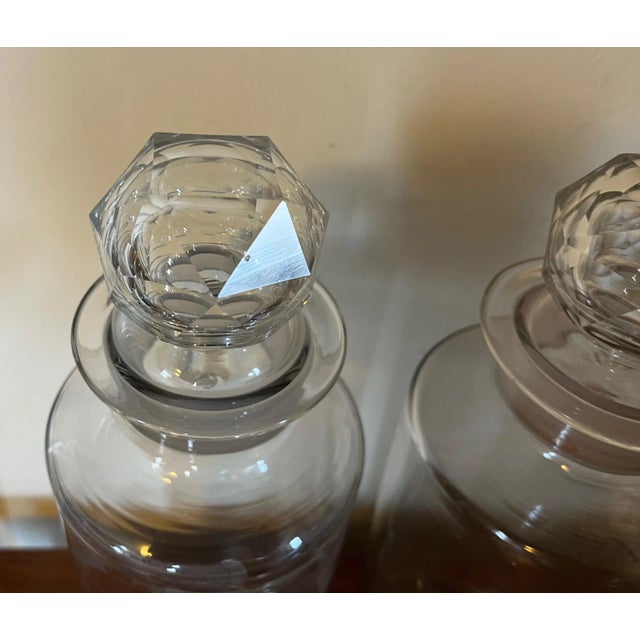 Pair large antique 19th century glass pharmacy or pickle jars with cut crystal stoppers. Wide mouth opening and polished...